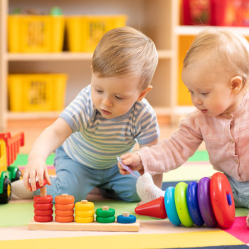 two toddlers playing