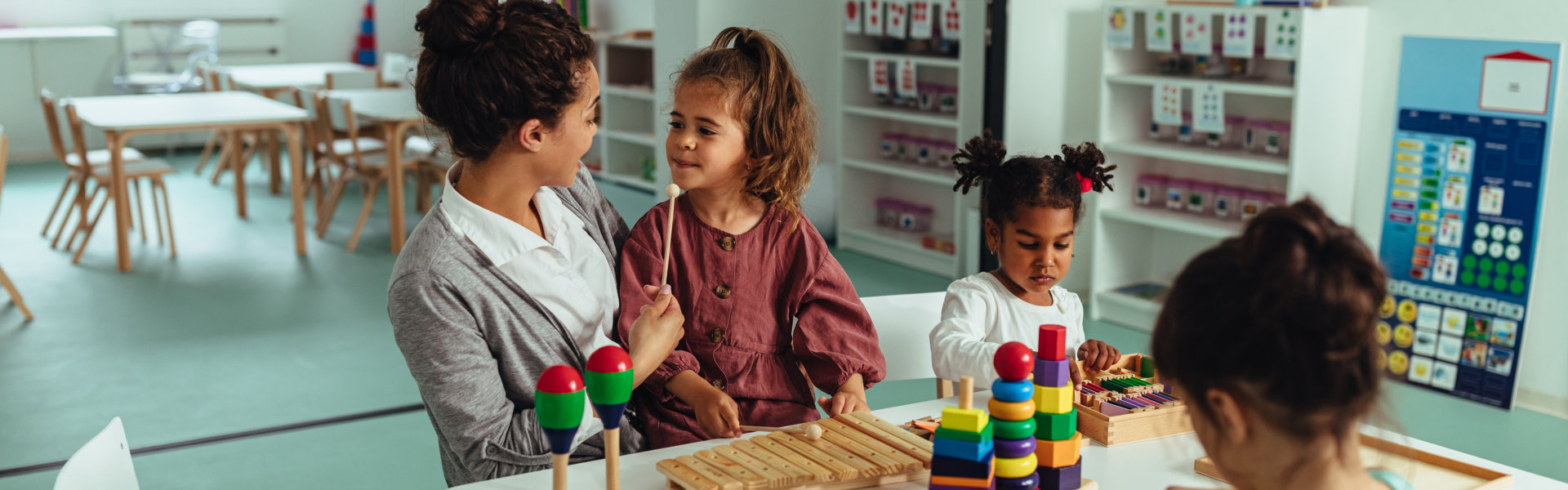 Toddlers engaged in playful learning, Montessori of Anaheim, Anaheim, CA.